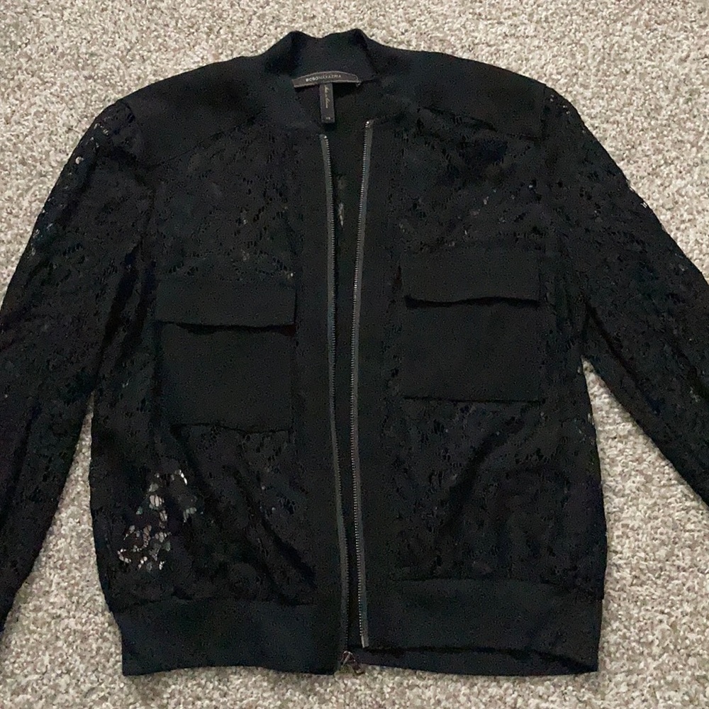 Brand new BcBg see thru sweater.